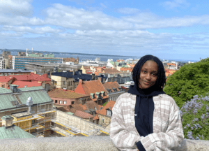 Student on balcony overlooking Lund, Sweden